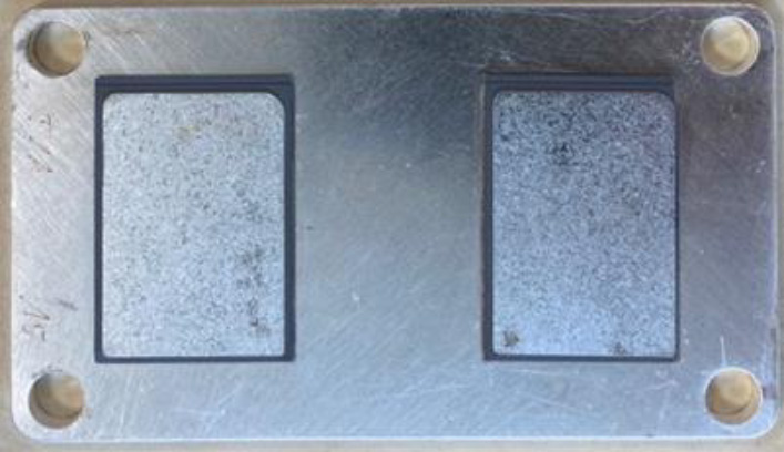 Figure 1: Ag coated Baseplate with two sintered substrates