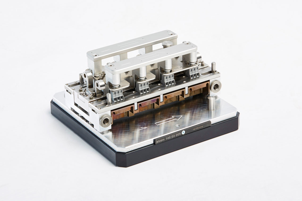 Efficient Workpiece Carriers for Automated Soldering Processes with Satellite Carriers Efficient Workpiece Carriers for Automated Soldering Processes with Satellite Carriers