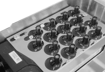 FUJI Corporation’s Automated Nozzle Setup and Changeover Earns a 2026 Global Technology Award FUJI Corporation Automated Nozzle Supply Unit integrated with NXTR A SMT placement platform