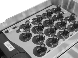 FUJI Corporation Automated Nozzle Supply Unit integrated with NXTR A SMT placement platform